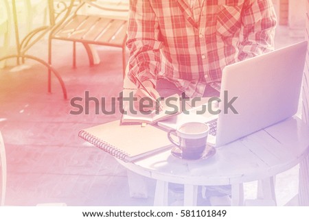 businessman working with laptop coffee on background,