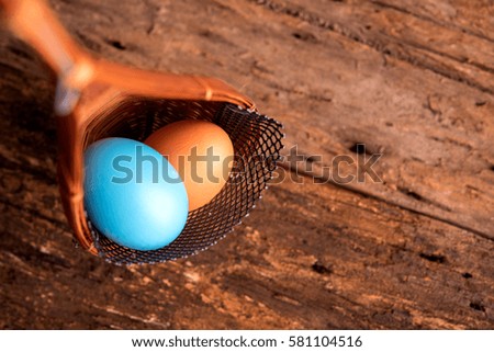 colorful easter egg in the basket 