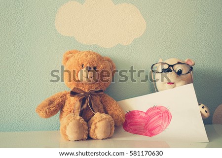 Teddy bear and the heart of love.