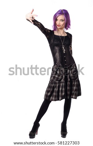 Portrait of a young girl with pink hair. Isolated over white background.