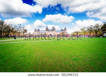 Rijksmuseum and spring green lawn, Amsterdam Netherlands, retro toned