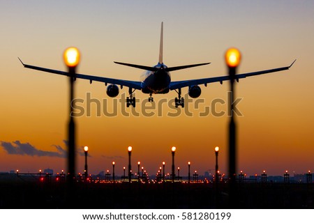 sunset landing in Brussels Zaventem Airport Royalty-Free Stock Photo #581280199