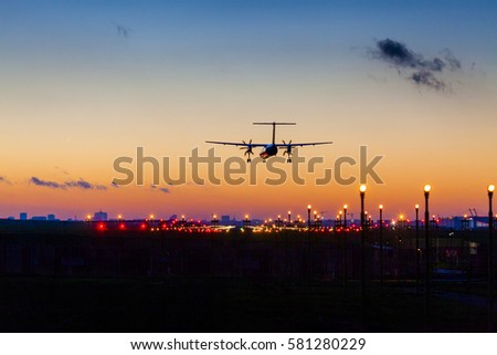sunset landing in Brussels Zaventem Airport Royalty-Free Stock Photo #581280229