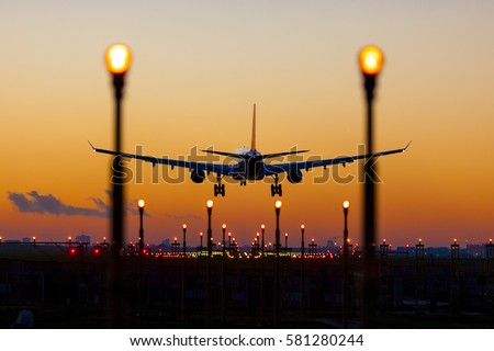 sunset landing in Brussels Zaventem Airport Royalty-Free Stock Photo #581280244