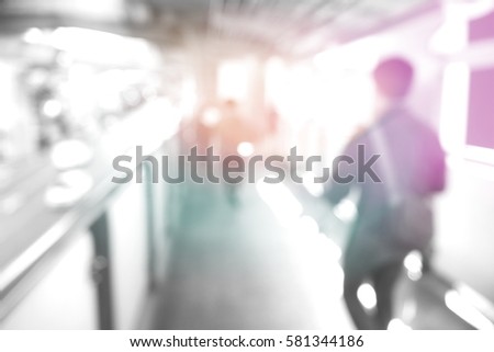 Picture blurred  for background abstract and can be illustration to article of people walking on skywalk