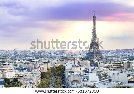 Evening Eiffel tower and Paris city view form Triumph Arc. Eiffel Tower from Champ de Mars, Paris, France. Beautiful Romantic background.
