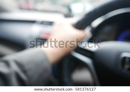 Picture blurred  for background abstract and can be illustration to article of hand drive wheel car