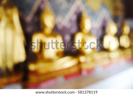 Picture blurred  for background abstract and can be illustration to article of Buddha statue in temple Thailand