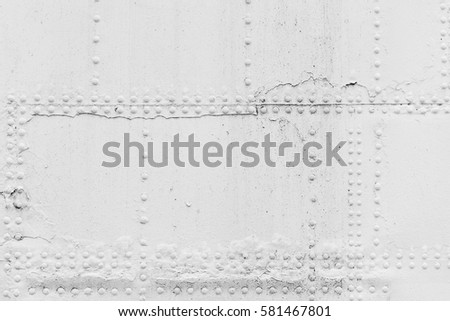 Old ship hull fragment, white iron sheets with rivets, background photo texture