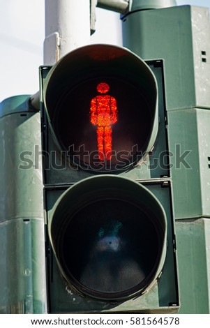 Traffic light with the red man sympol.