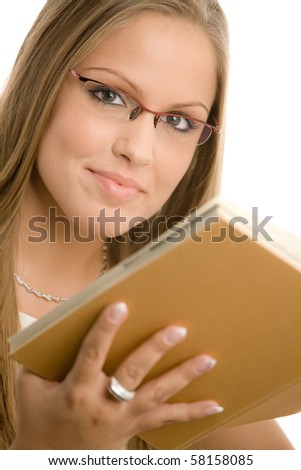 Closeup protrait of beautiful college girl reading book. Isolated on white background.