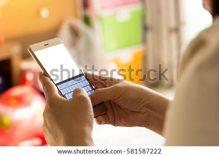Girl transfer information on mobile device.
