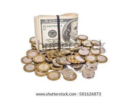 the stack of bills on the hill of coins 