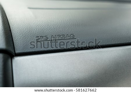 The inscription "SRS Airbag" on dashboard inside the car. Safety in the car concept