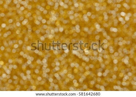 Abstract orange glitter sparkle bokeh background Halloween Autumn or holiday party invite. High resolution photo.