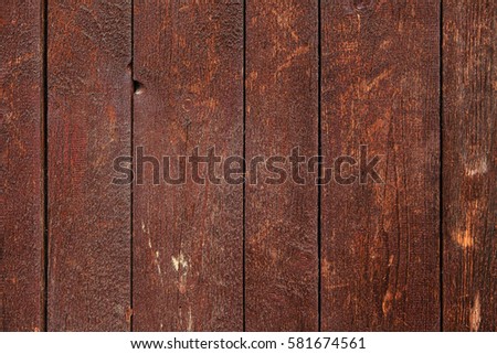Big old dark red wood plank texture. Maroon wood boards backdrop. Grungy retro wooden structure desktop image. Old ragged red wood decorative background. Shabby timber desktop pattern. Damaged timber.