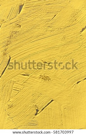 Painting close up of primrose yellow pantone color  texture for interesting, creative, imaginative backgrounds. For web and design.

