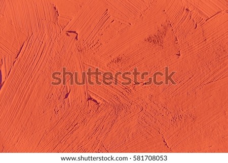 Painting close up of red pantone flame color  texture for interesting, creative, imaginative backgrounds. For web and design.
