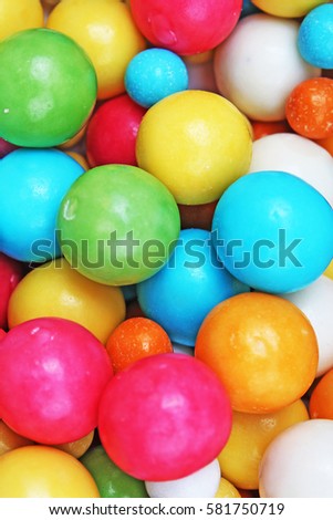 Bubble gum chewing gum texture. Rainbow multicolored gumballs chewing gums as background. Round sugar coated candy bonbon bubblegum texture. Colorful multicolor bubblegums wallpaper. Candy background
