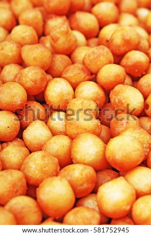 Soup balls. Soup pearls texture. Fried batter pearls ("Backerbsen") - Bavarian soup garnish specialty. Soup bread balls food photo studio photography
