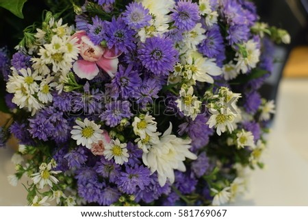 A bouquet of flowers on the table