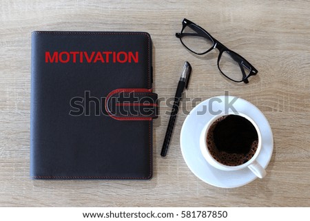 Business concept - Top view cover notebook writing Motivation