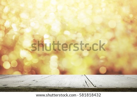 Wooden desk or wooden floor  on bokeh background.   Empty wooden desk to present and show product