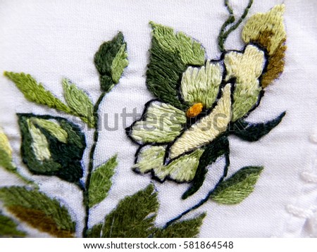 embroidered flowers on a white background                               