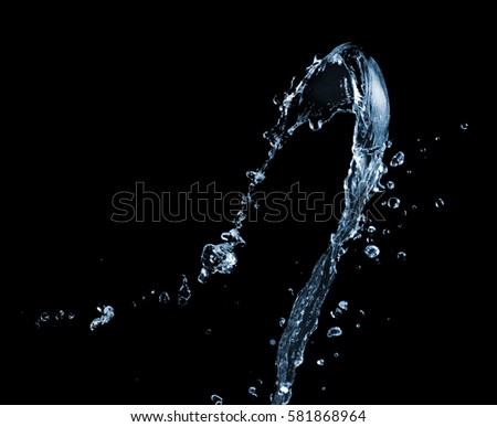 Clear water wave splash with drops on a black