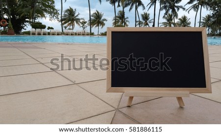 blank chalkboard at the pool. Composition of Nature.

