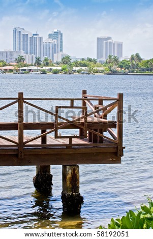 Modern buildings in Hollywood Florida. View from a wooden boat dock