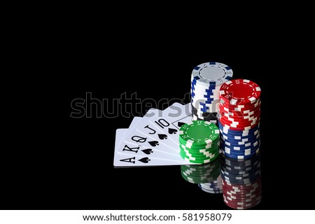 Cards to poker and colorful chips on black background