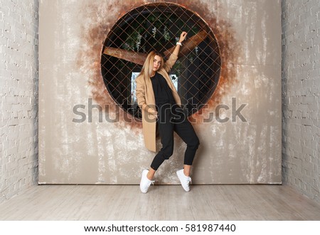 Street dance girl dancer on textured background