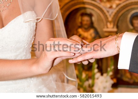 Man giving an engagement ring to his girlfriend wedding concept