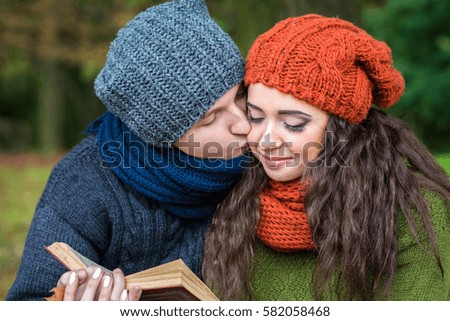 loving couple reads a book