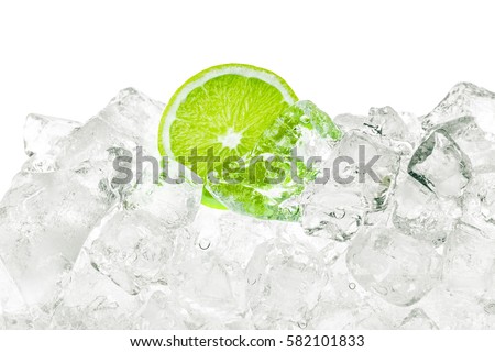 Ice cubes and green lime background.