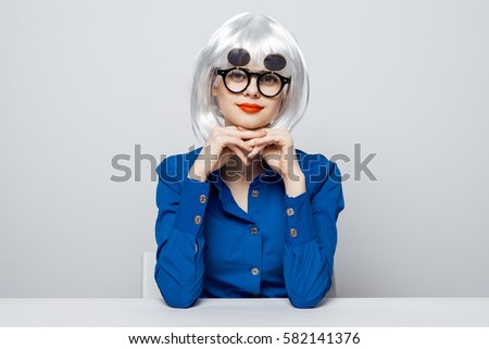 woman in glasses.