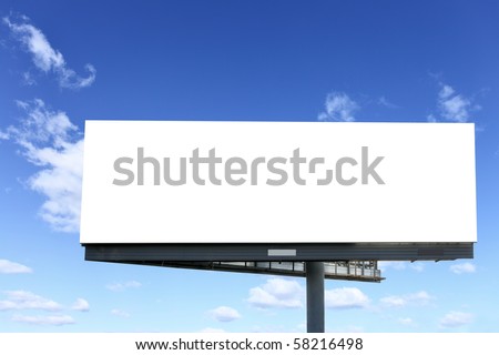 Blank billboard against blue sky, put your own text here Royalty-Free Stock Photo #58216498