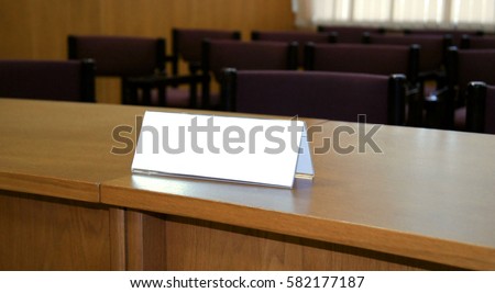 white empty label for the name in the empty hall. space for text Royalty-Free Stock Photo #582177187