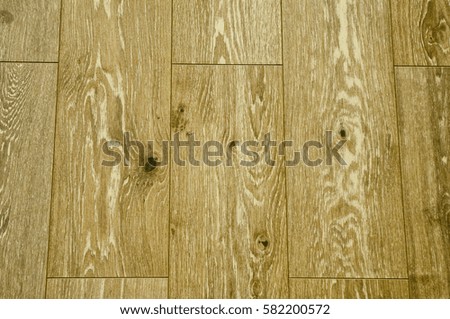 Wooden boards on the floor, the compound floor boards. Texture.