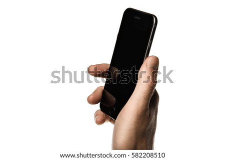 Close up of a man using mobile smart phone on white background