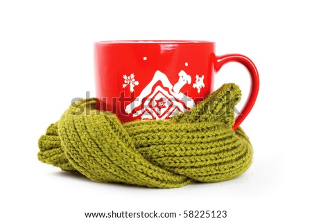 cup of tea wrapped in green scarf Royalty-Free Stock Photo #58225123