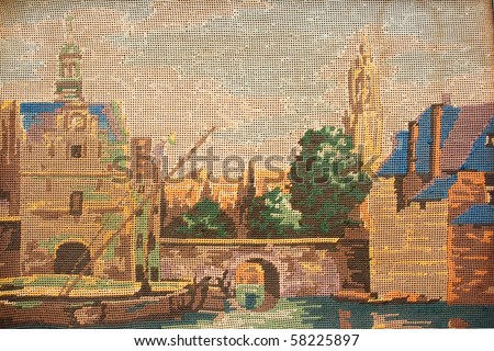 Fragment of colorful retro fairytale tapestry textile pattern with elements of old castle and watermill useful as background (Flea Market, Tel Aviv)