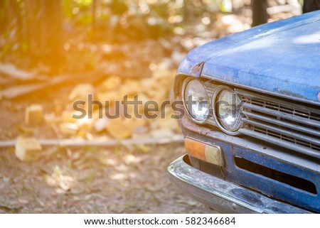 Attractive blue old retro car in Thailand Royalty-Free Stock Photo #582346684