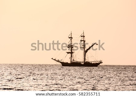 Photo Picture of a Sail Boat Silhouette  at Sunset