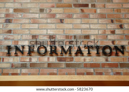 Information Sign on Brick Wall