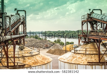 High Angle View from the Top of Grain Silos Looking Down a Construction Site with Cloudy Sky - Minneapolis, Minnesota.