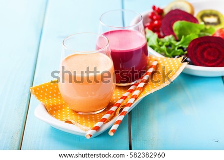 Detox diet - smoothies from beet and carrots. Selective focus. Copy space