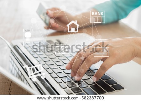 internet banking network. business people using laptop computer with icon application online payment. 
 Royalty-Free Stock Photo #582387700