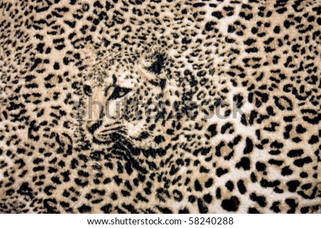 The texture of fabric with the image of a leopard background